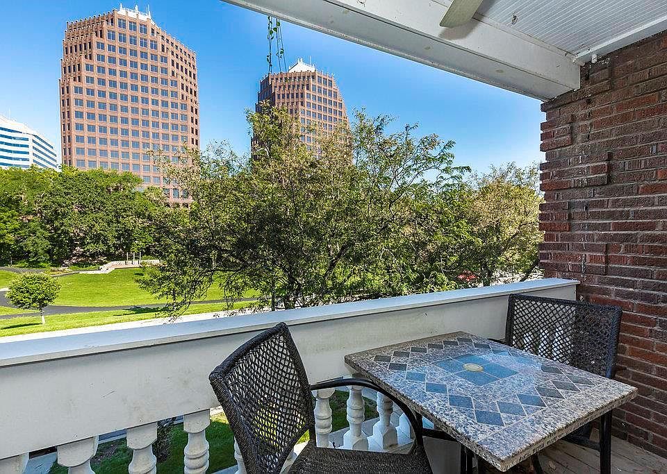 Yes, this picture obviously was not taken in the winter, however this is the balcony located at unit 2S! Located directly across from Mill Creek Park! Very close to Saint Lukes Hospital and not far from Children's Mercy Hospital or Truman Hospital. Just