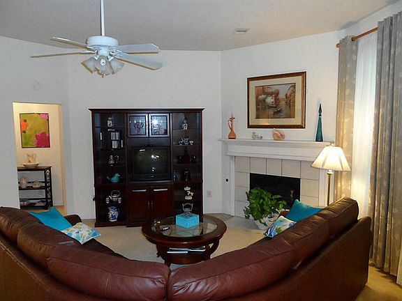 2" Faux blinds & custom drapes.
