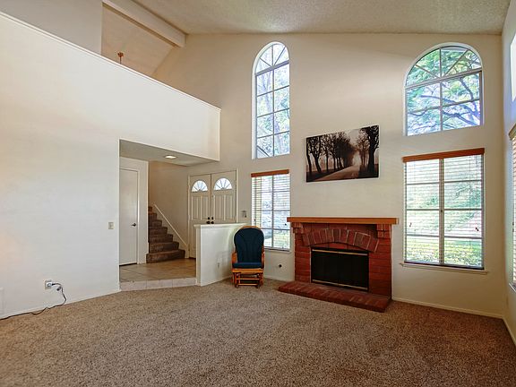 Spacious Living Room w/ Rustic Brick Gas Fireplace