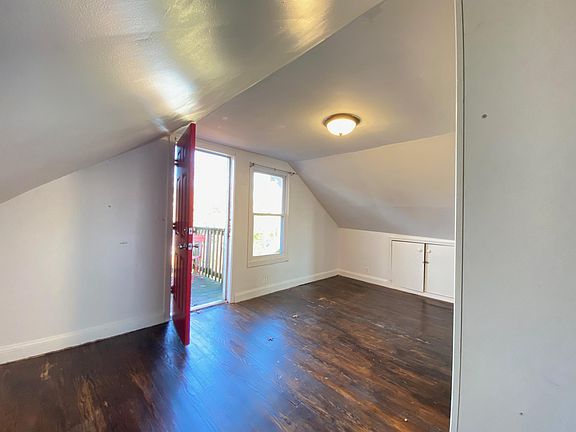 bedroom 2 with a small balcony