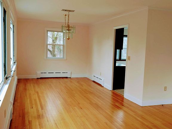 Dining room, attached to the Living room on the right. Kitchen is through door on right.