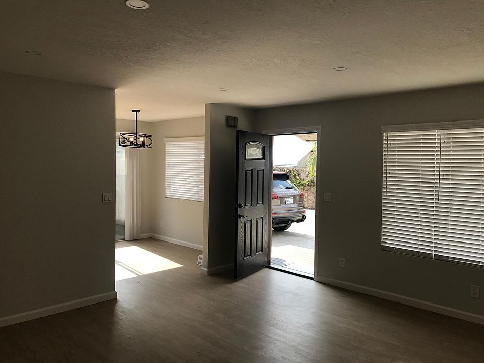 Entrance. New 2 inch blinds and vinyl flooring