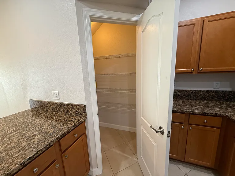9519 SW Merlin Ct — Photo 12