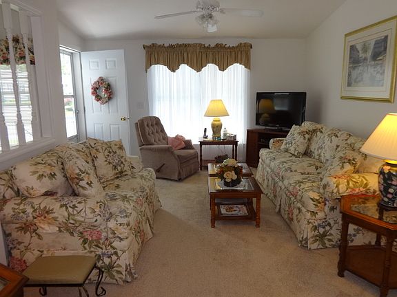 Newer carpet graces this ho...