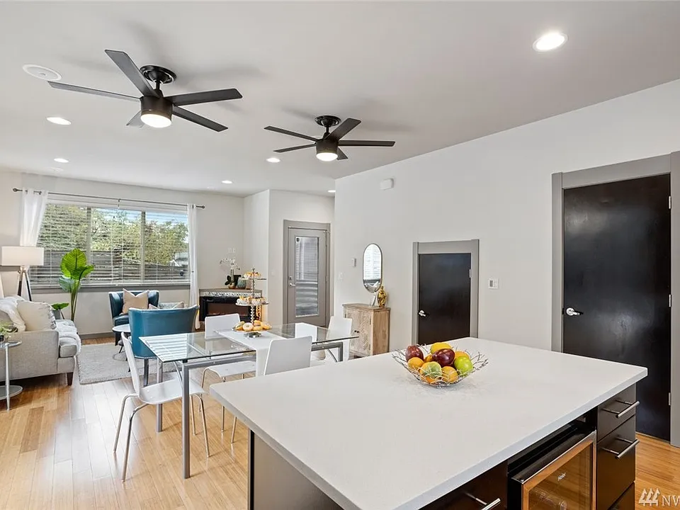 Main living area flows seamlessly from the kitchen to the living room.