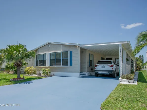 703 Hyacinth Cir, Barefoot Bay, FL 32976