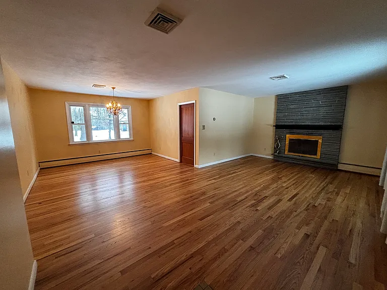 Very versatile large living and dining room area with great natural light