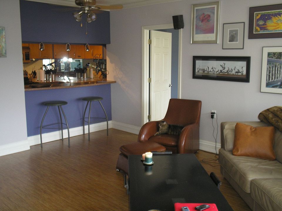 Kitchen with view of the living room