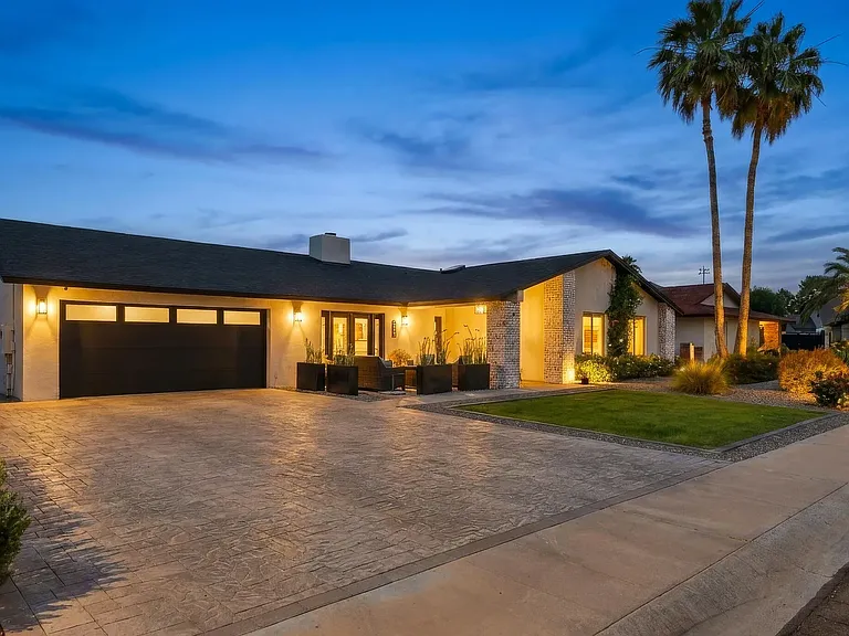 Beautiful fully remodeled home, radiating a warm inviting glow at night time...