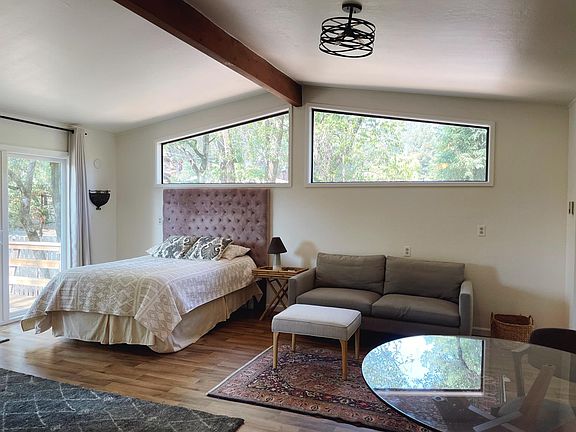 The spacious living area gets lots of natural light.