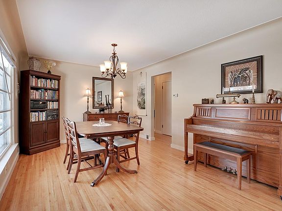 Spacious living/dining room with hardwood floors
