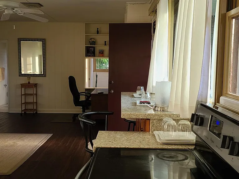 The view from kitchen to living room and bed room.