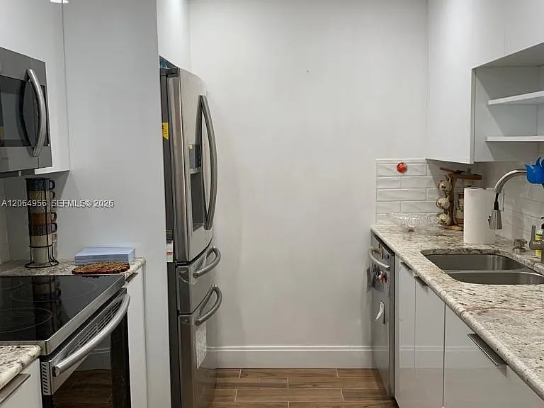 151 SW 135th Ter #109T — Photo 6
