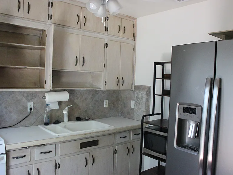 kitchen with floor to ceiling cabinets