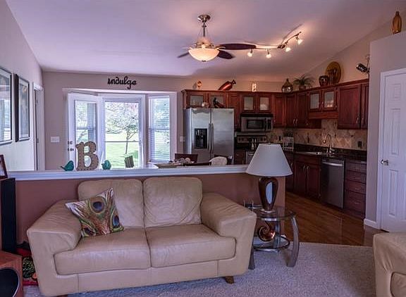 Open floor plan with kitchen and living room.