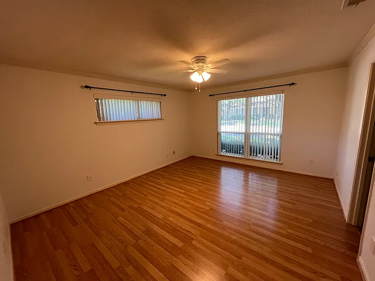 Primary bedroom with walk-in closet and en-suite bath