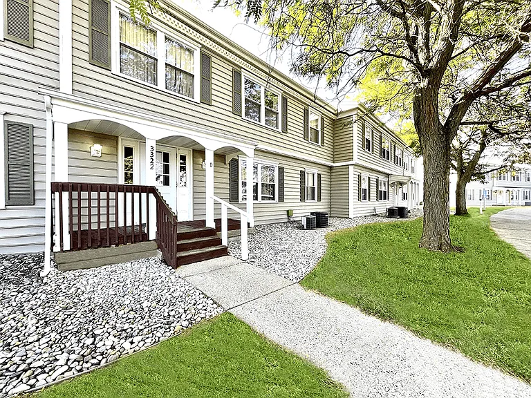 Charming Exterior with Louvered Shutters