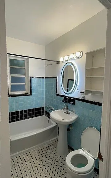 super cool bath with multicolor lighted mirror