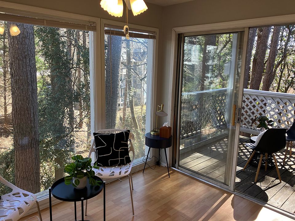 Sunroom and patio with clear view outside.