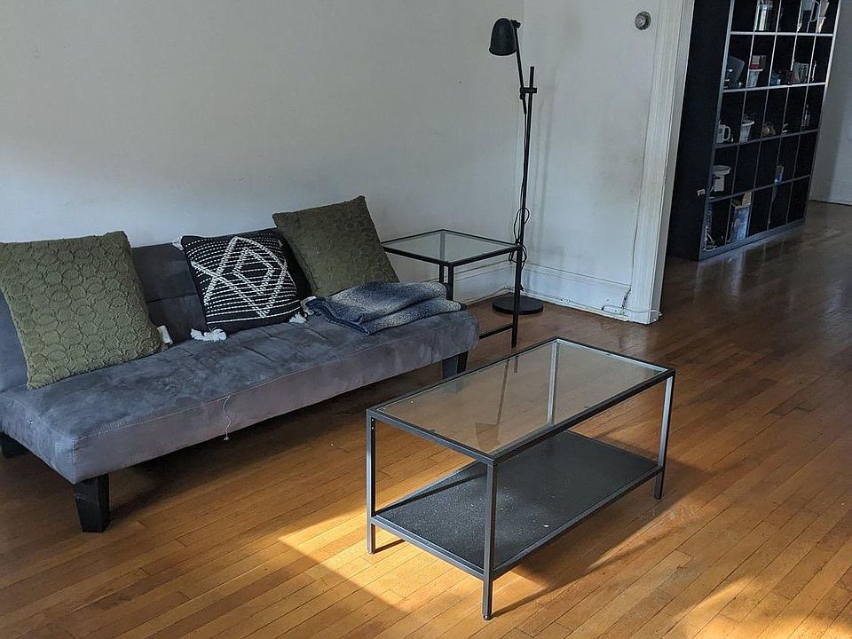 Living room. Comes with couch, nesting coffee tables, tv plus stand, lamp.