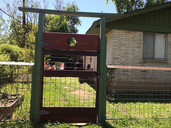 Backyard gate opens directly onto Little Zilker Park and the