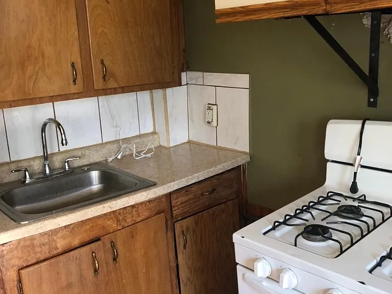 Stove is less than a year old, as is fridge