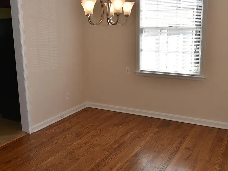 Dining room: 5-light chandelier w/ dimmer, refinished floors.