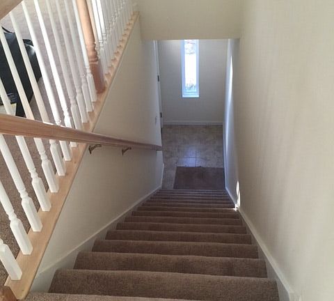 Stairs going up to 2nd floor