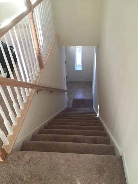 Stairs going up to 2nd floor