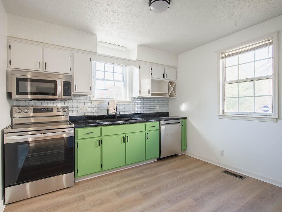 Open kitchen - new stove, microwave and dishwasher
