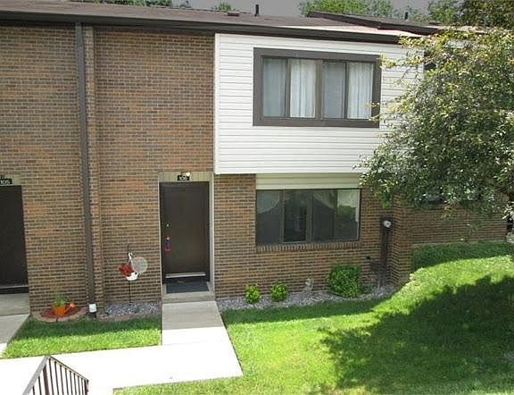 The front door has been painted tan since this photo was taken.
