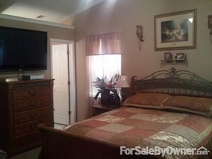 North View of Den
						:
						High ceilings, tile floors make this a very usable room.