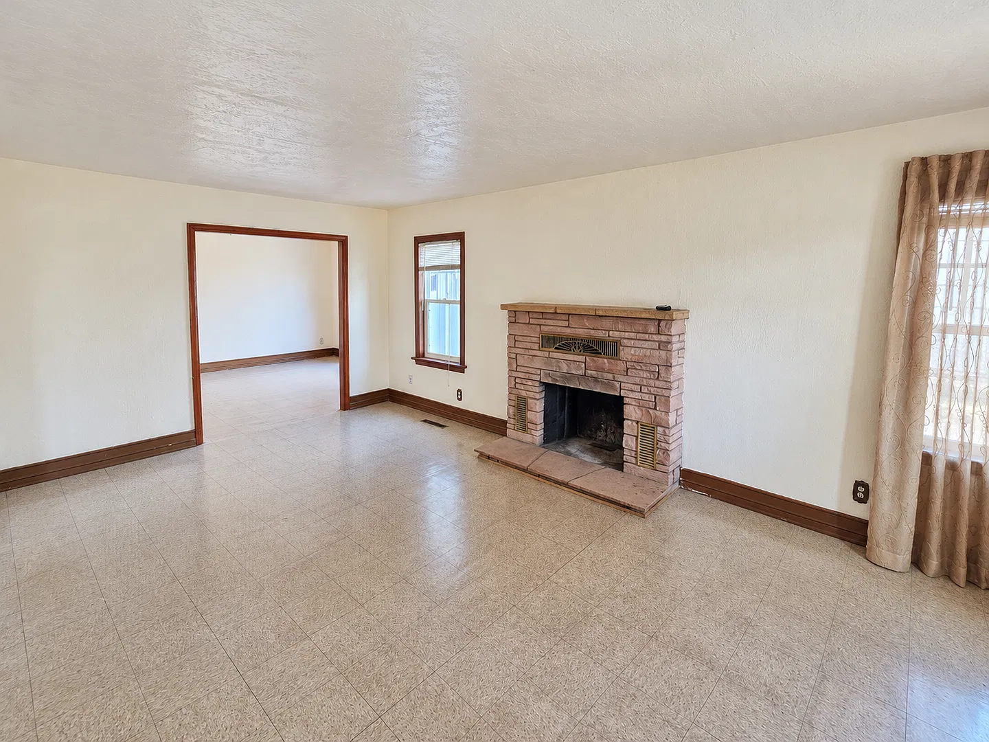 Spacious 3-Bedroom Home with Classic Charm, Sunroom & Private Backyard — Photo 4