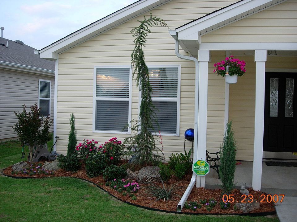 front yard with beautiful landscaping