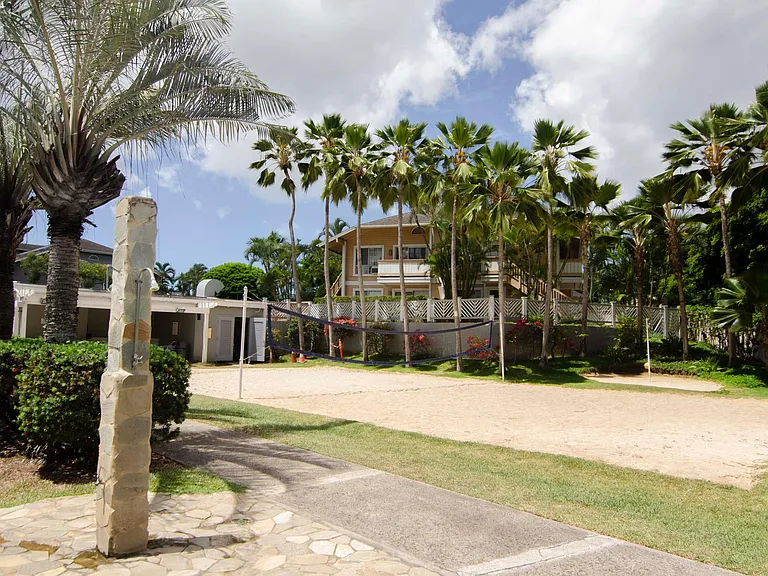 Beach volleyball court and tetherball