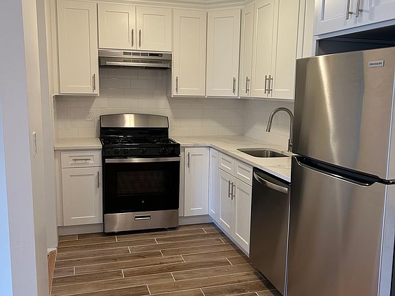 Brand New Kitchen with stainless steel appliances and granite countertops