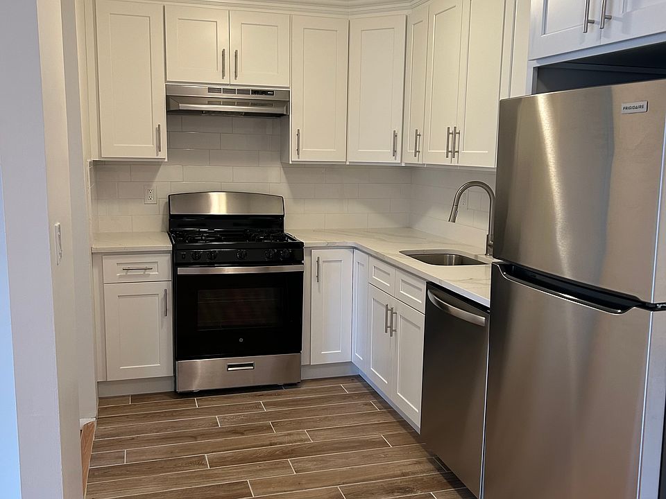 Brand New Kitchen with stainless steel appliances and granite countertops