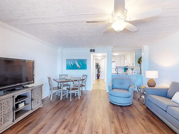 Living room w/ kitchen view