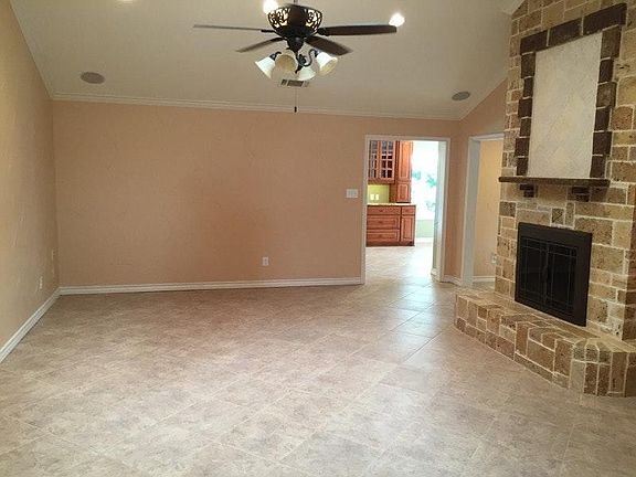Ceramic tile floors through kitchen, dining, study and living room.
