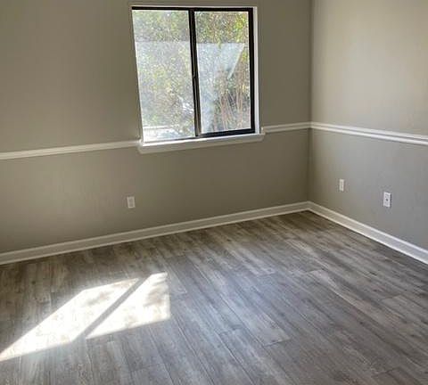 Front Bedroom. Both bedrooms are upstairs. (Brand new windows are also forthcoming).