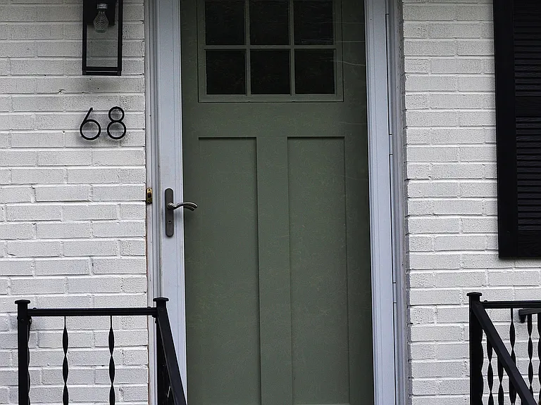 Modern updated door with new storm door.