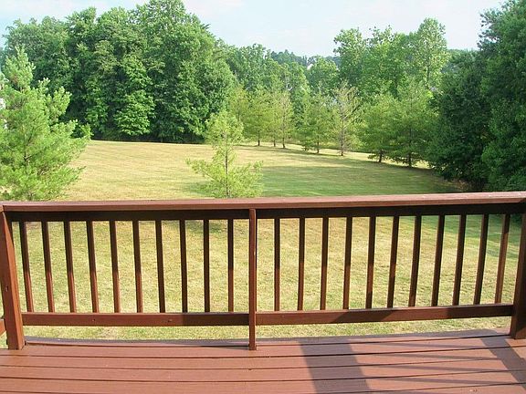 View from kitchen balcony facing south toward backyard