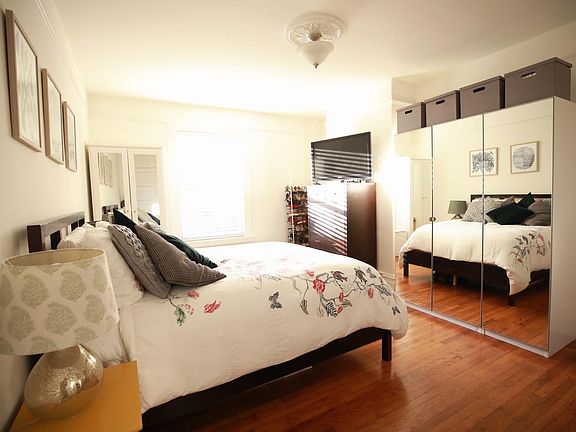 Bedroom. Wardrobe with mirrors is included. Note that apartment is unfurnished