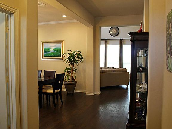 Wood flooring throughout most of the rooms.