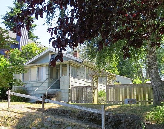 Tiny home on a wonderful large, fully fenced lot.