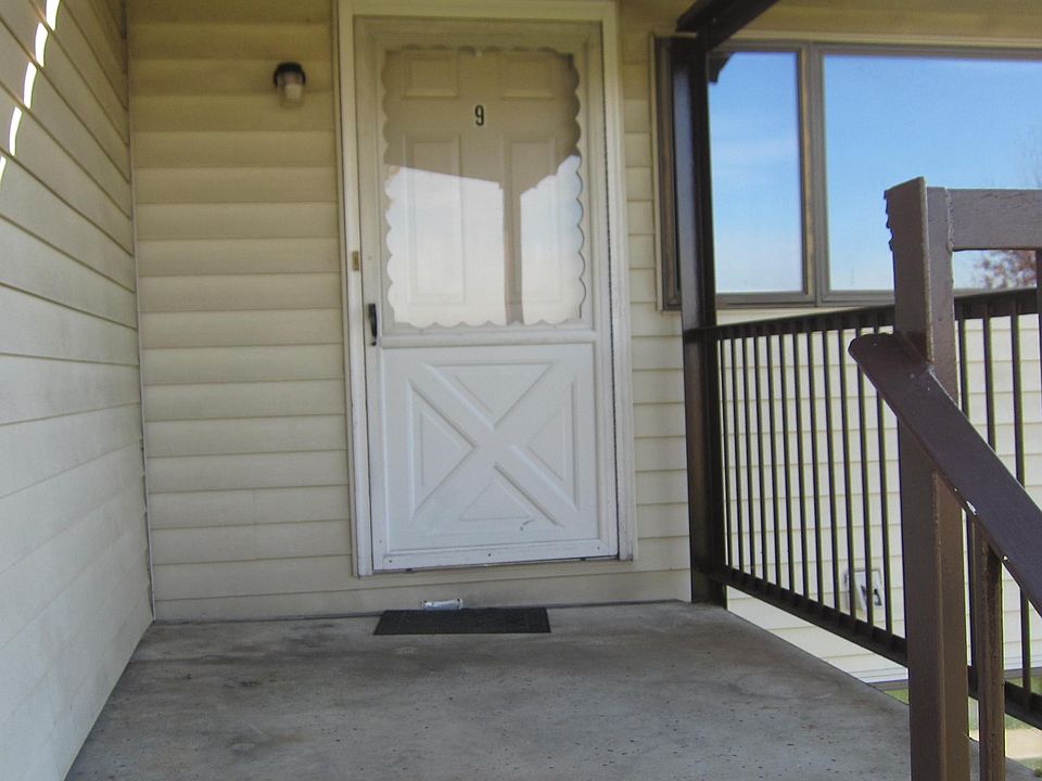 Entrance to Apt 9 on second floor, porch area