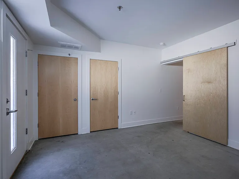 Front interior entrance with storage in a unit at The Sawyer.