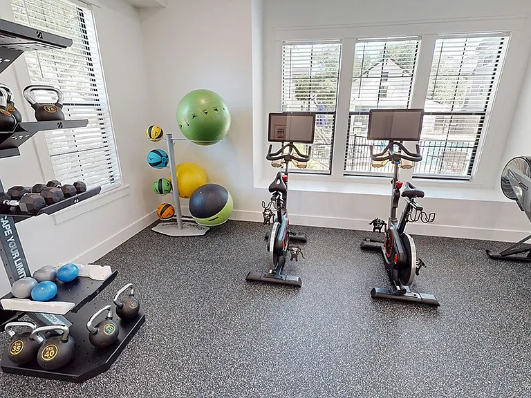 Our community provides a separate fitness studio with Echelon Bikes and Reflect