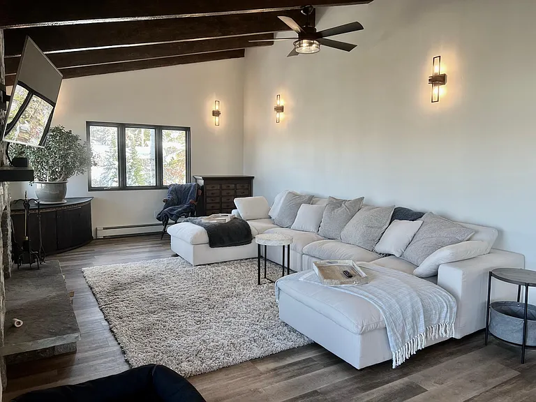 Cozy up by the wood burning fireplace