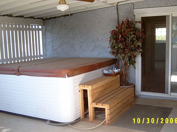 Private, enclosed patio off the master bedroom. Back yard 